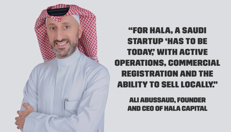 A man in traditional Saudi attire stands with crossed arms, accompanied by a quote about startup operations, attributed to Ali Abussaud.